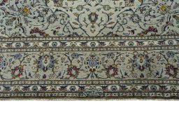 Full view of 2000s Kashan rug from Iran / Persia, 352 × 250 cm in Beige tones
