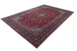 Corner detail of 1970s Kashan rug showing border pattern and Wool pile