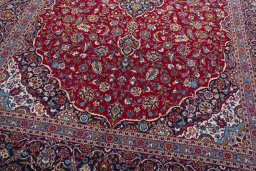 Close-up detail of 1970s Kashan rug from Iran / Persia showing Wool weave