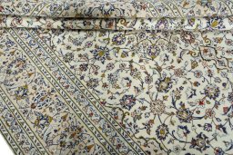 Close-up detail of 2000s Kashan rug from Iran / Persia showing Wool weave