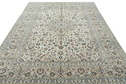 Surface texture of 2000s Kashan rug with natural Wool and intricate pattern