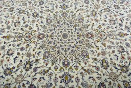Central medallion detail of 2000s Kashan rug from Iran / Persia
