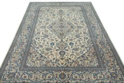 Surface texture of 2000s Kashan rug with natural Wool and intricate pattern