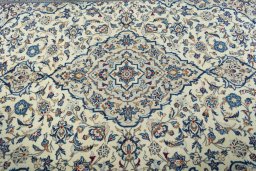 Central medallion detail of 2000s Kashan rug from Iran / Persia