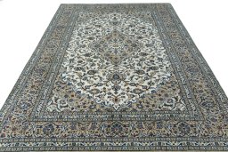 Surface texture of 2000s Kashan rug with natural Wool and intricate pattern