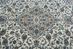 Central medallion detail of 2000s Kashan rug from Iran / Persia