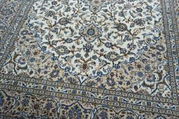 Close-up detail of 2000s Kashan rug from Iran / Persia showing Wool weave