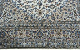 Full view of 2000s Kashan rug from Iran / Persia, 360 × 246 cm in Beige tones