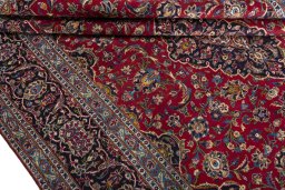 Close-up detail of 2000s Kashan rug from Iran / Persia showing Wool weave