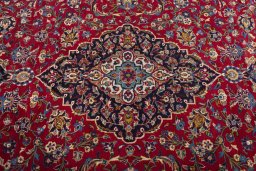 Central medallion detail of 2000s Kashan rug from Iran / Persia