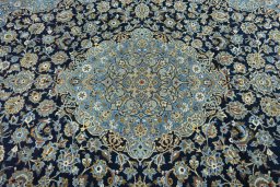 Central medallion detail of 2000s Kashan rug from Iran / Persia
