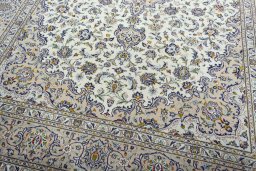 Close-up detail of 2000s Kashan rug from Iran / Persia showing Wool weave