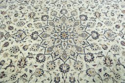 Central medallion detail of 2000s Kashan rug from Iran / Persia
