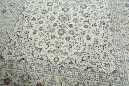 Close-up detail of 2000s Kashan rug from Iran / Persia showing Wool weave