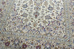 Close-up detail of 2000s Kashan rug from Iran / Persia showing Wool weave