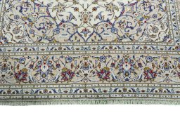 Full view of 2000s Kashan rug from Iran / Persia, 293 × 200 cm in Beige tones