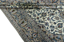 Close-up detail of 2000s Kashan rug from Iran / Persia showing Wool weave