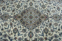 Central medallion detail of 2000s Kashan rug from Iran / Persia