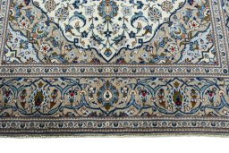 Full view of 2000s Kashan rug from Iran / Persia, 300 × 194 cm in Beige tones