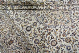 Close-up detail of 2000s Kashan rug from Iran / Persia showing Cork weave