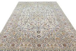 Surface texture of 2000s Kashan rug with natural Cork and intricate pattern