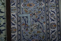 Central medallion detail of 2000s Kashan rug from Iran / Persia