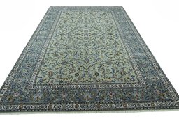 Surface texture of 2000s Kashan rug with natural Wool and intricate pattern