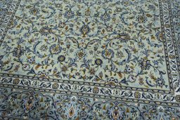 Close-up detail of 2000s Kashan rug from Iran / Persia showing Wool weave
