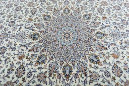 Central medallion detail of 2000s Kashan rug from Iran / Persia