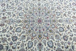 Central medallion detail of 2000s Kashan rug from Iran / Persia