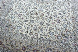 Close-up detail of 2000s Kashan rug from Iran / Persia showing Wool weave