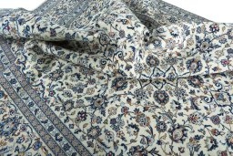 Surface texture of 2000s Kashan rug with natural Wool and intricate pattern