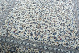 Close-up detail of 2000s Kashan rug from Iran / Persia showing Wool weave