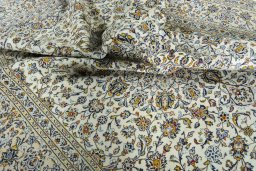 Surface texture of 2000s Kashan rug with natural Wool and intricate pattern