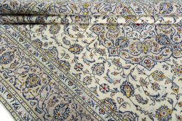 Close-up detail of 2000s Kashan rug from Iran / Persia showing Wool weave