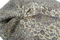 Surface texture of 2000s Kashan rug with natural Wool and intricate pattern