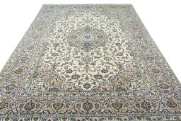 Surface texture of 2000s Kashan rug with natural Wool and intricate pattern