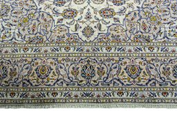Full view of 2000s Kashan rug from Iran / Persia, 355 × 245 cm in Beige tones