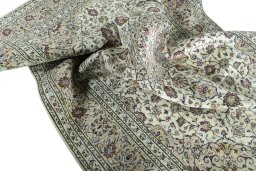 Surface texture of 2000s Kashan rug with natural Wool and intricate pattern