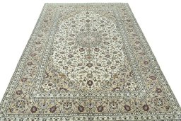 Surface texture of 2000s Kashan rug with natural Wool and intricate pattern