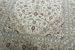 Close-up detail of 2000s Kashan rug from Iran / Persia showing Wool weave