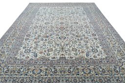 Surface texture of 2000s Kashan rug with natural Wool and intricate pattern