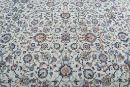 Central medallion detail of 2000s Kashan rug from Iran / Persia