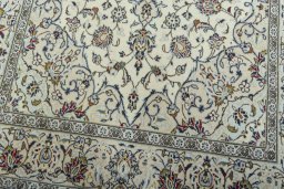 Close-up detail of 2000s Kashan rug from Iran / Persia showing Wool weave
