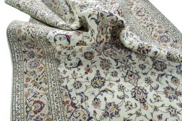 Surface texture of 2000s Kashan rug with natural Wool and intricate pattern