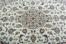 Central medallion detail of 2000s Kashan rug from Iran / Persia