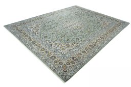 Corner detail of 2000s Kashan rug showing border pattern and Wool pile