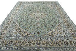 Surface texture of 2000s Kashan rug with natural Wool and intricate pattern