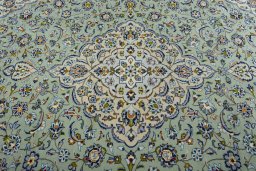 Central medallion detail of 2000s Kashan rug from Iran / Persia