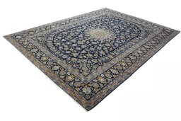 Corner detail of 2000s Kashan rug showing border pattern and Wool pile
